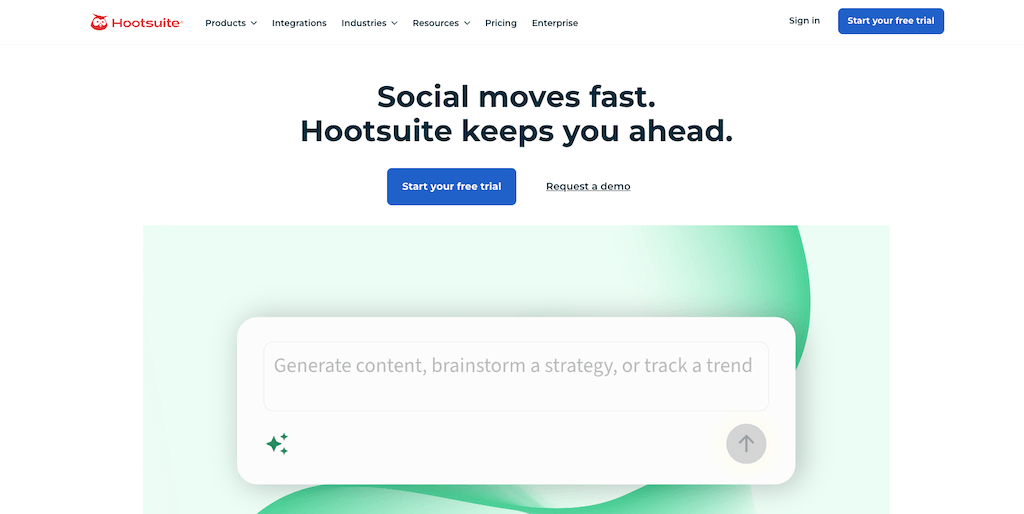 The homepage of Hootsuite showcasing its social media management features and trending content prompt bar.