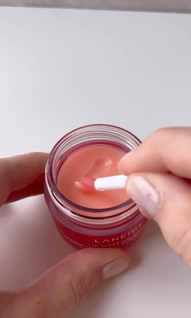 Effective Social Media Content Strategies for 2024. Using the applicator to use the Laneige lip gloss.