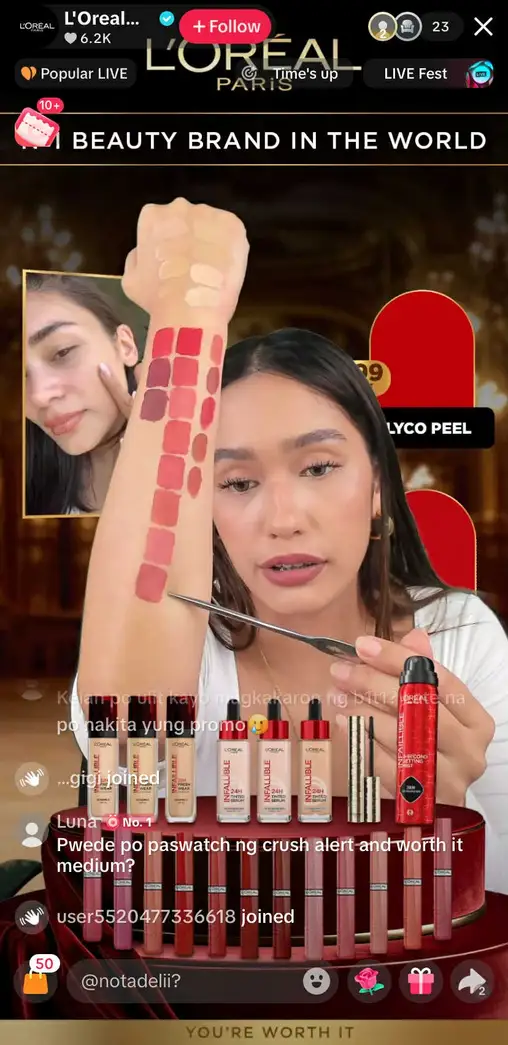A L'Oreal TikTok live where the host is swatching different products.