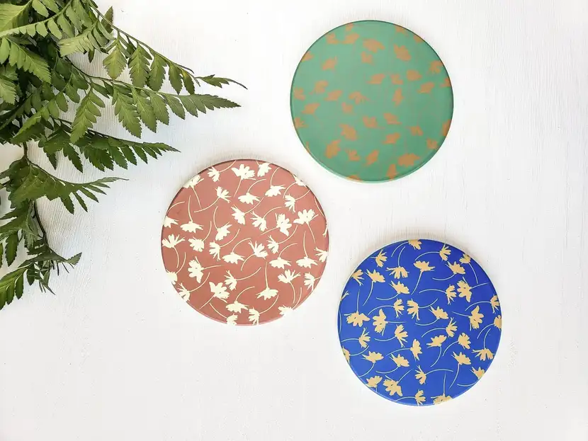 A bundle of cute desk coasters.