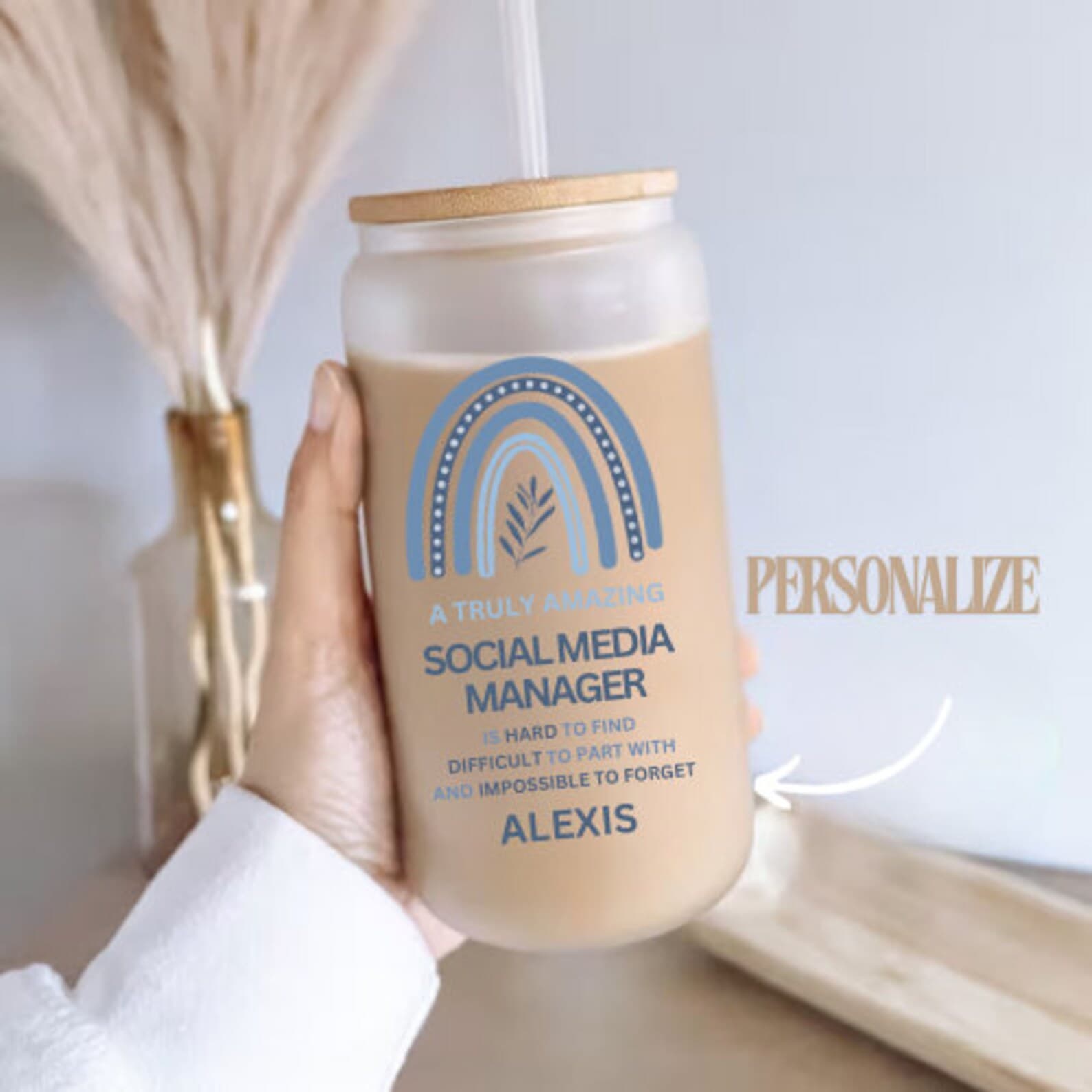 A personalized iced coffee tumbler perfect for social media managers.