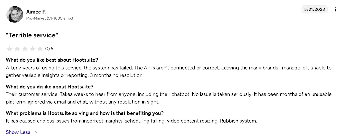 A screenshot of a negative Hootsuite review on G2.