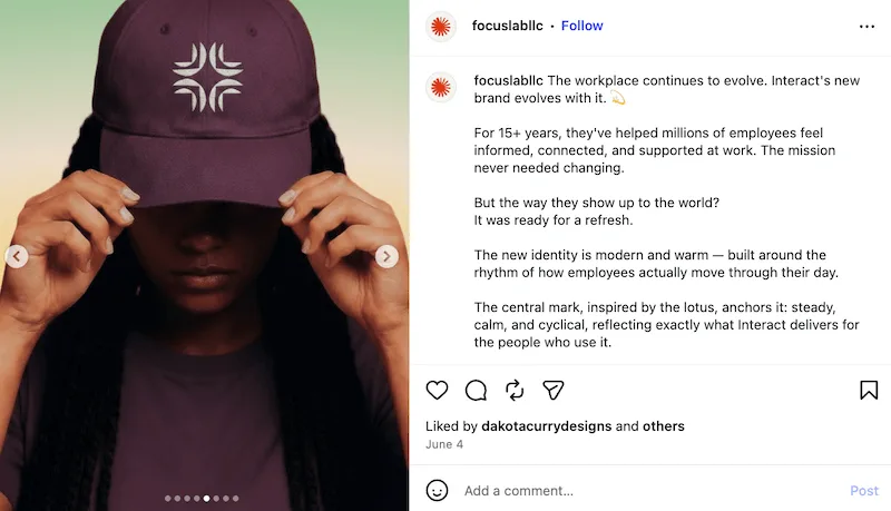 An Instagram close-up photo of a person pulling down the brim of a maroon baseball cap featuring a white logo.