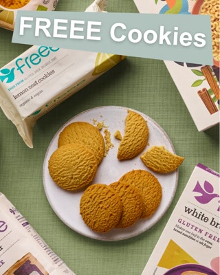 An artistic display of gluten-free lemon zest cookies and other baking products on a textured green background. The image highlights a plate of cookies with appealing packaging, evoking a natural and inviting mood.