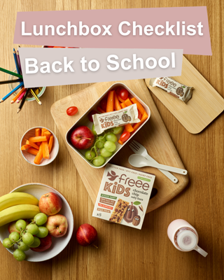 A vibrant image displaying a lunchbox filled with healthy snacks and Freee KIDS bars for a back-to-school theme. The mood is cheerful and organized.