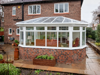 conservatory with white framed windows