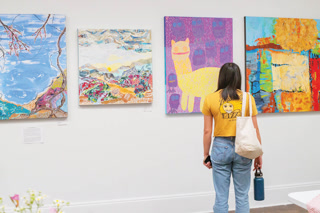 Colorful works by artists Jenny Blazing, King Nobuyoshi Godwin and Anne Gregory inspire gallery-goers during 5 Points Gallery’s Third Friday reception in May.